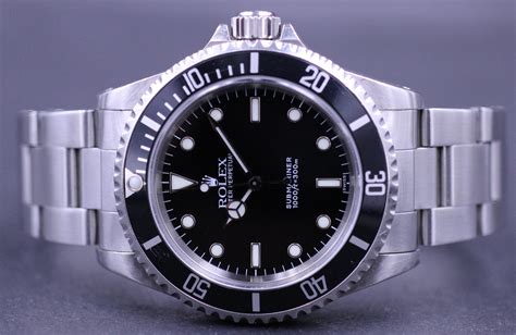 difference between rolex submariner 14060 and 14060m|Rolex 14060 swiss only dial.